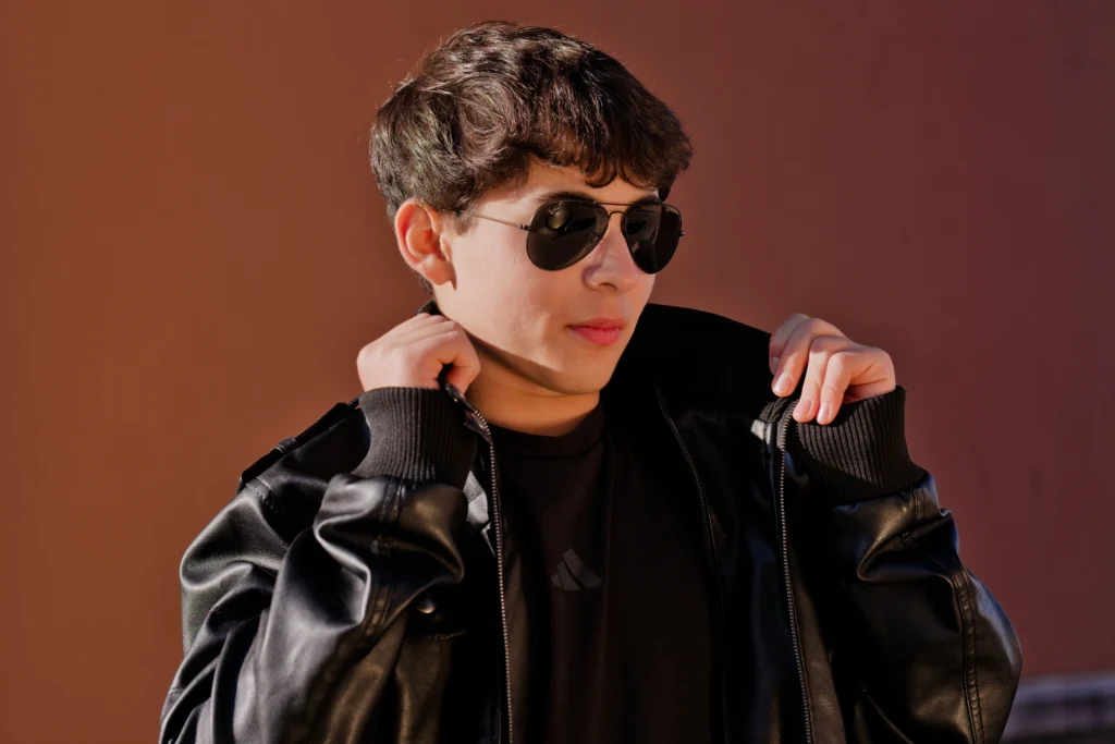 a Cincinnati high school senior posing in an urban setting