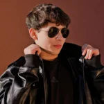 a Cincinnati high school senior posing in an urban setting