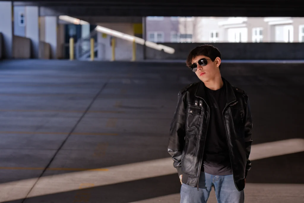 a Cincinnati high school senior posing in an urban setting