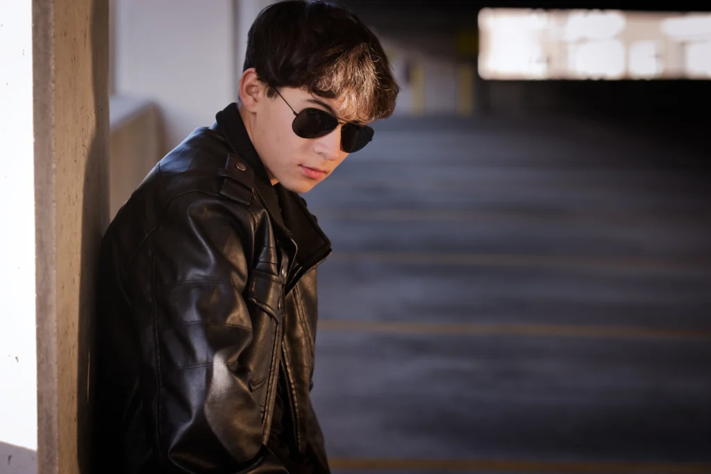 a Cincinnati high school senior posing in an urban setting
