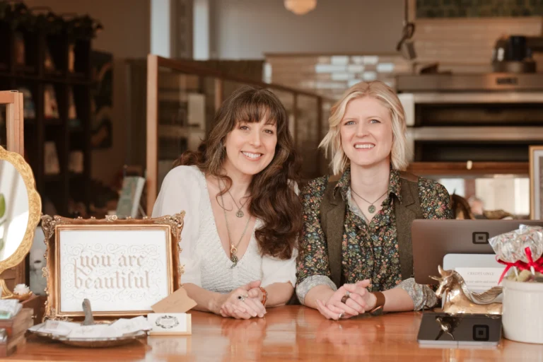 women smiling looking straight at the camera branding session newport kentucky