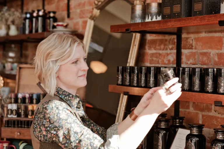 woman putting away tea box branding session newport kentucky