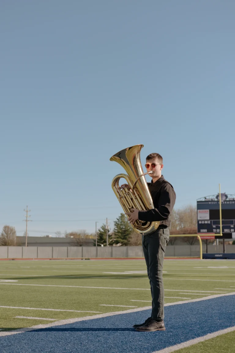 senior photo session at West Clermont High School Batavia ohio student playing a trumpet