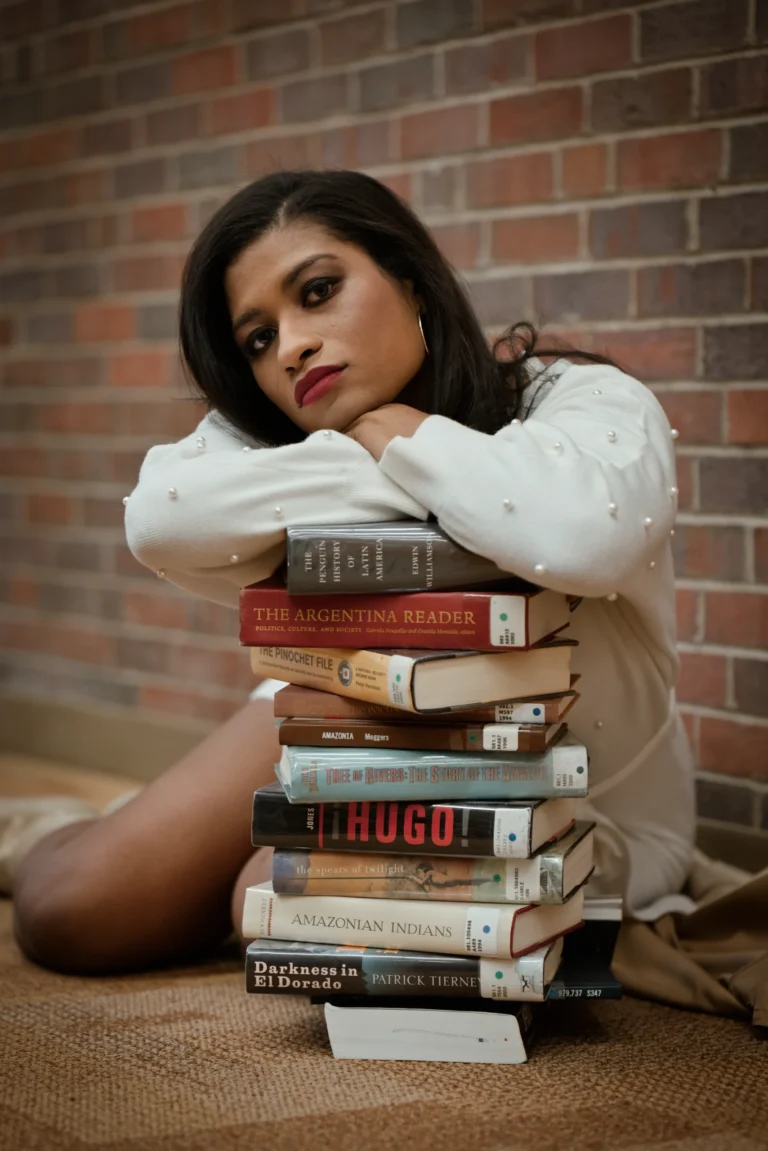 urban senior photo session with books at cincinnati ohio public library
